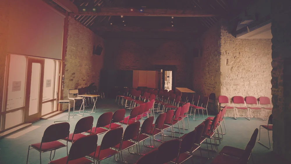 The Barn set out with chairs for an event